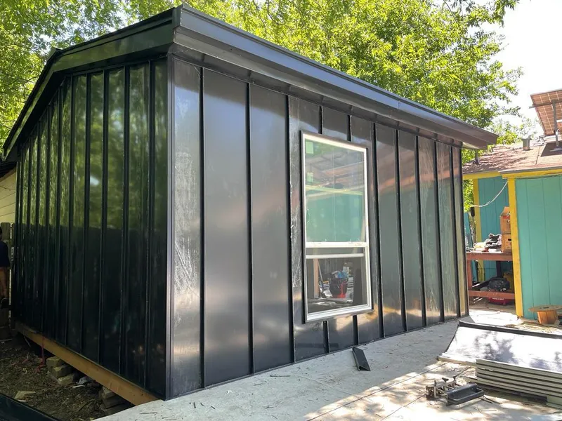 Black standing seam metal wall panels for Metal Roof Installation in Alachua